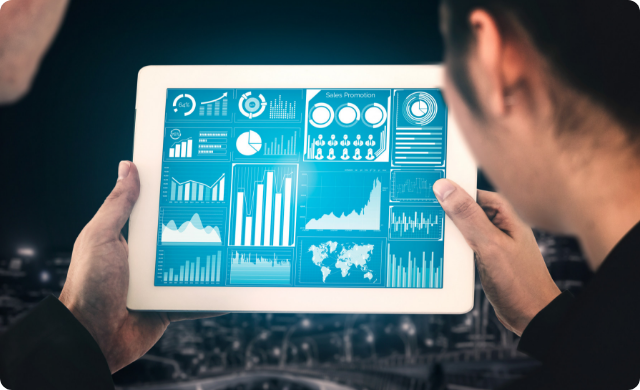 Healthcare professionals reviewing patient analytics and medical dashboards on digital tablet
